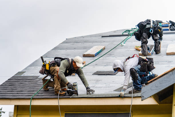 Professional Gutter Installation technician working in Queens Village, NY